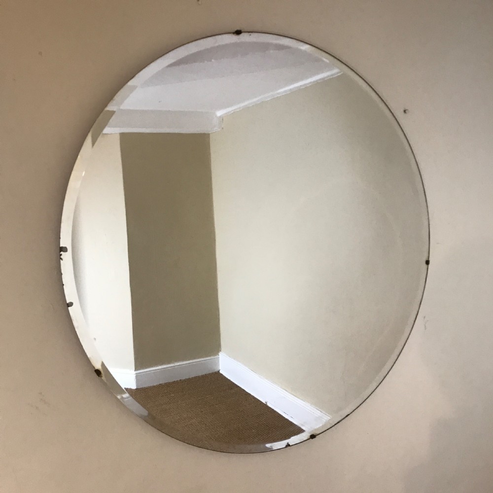 A large English Art Deco Circular Mirror c 1930