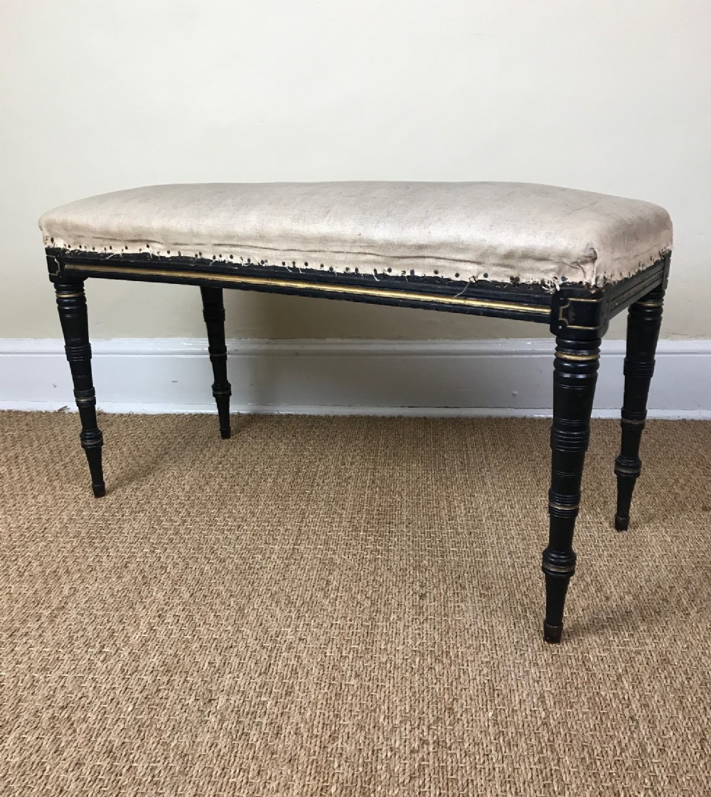 An Aesthetic Movement ebonised window stool c 1880
