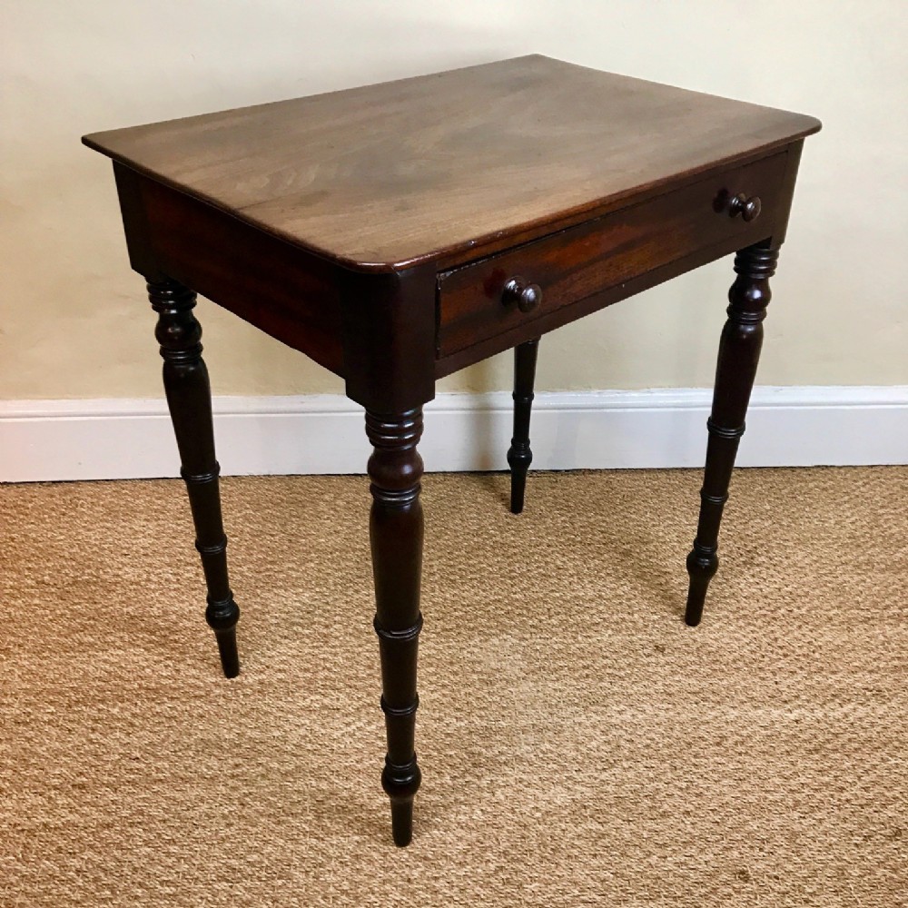 A George IV mahogany lamp table circa 1830