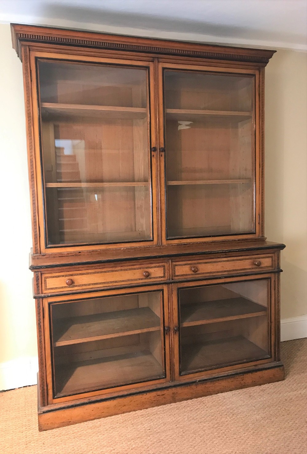 A fine quality Victorian Aesthetic Movt ash cabinet bookcase circa 1870