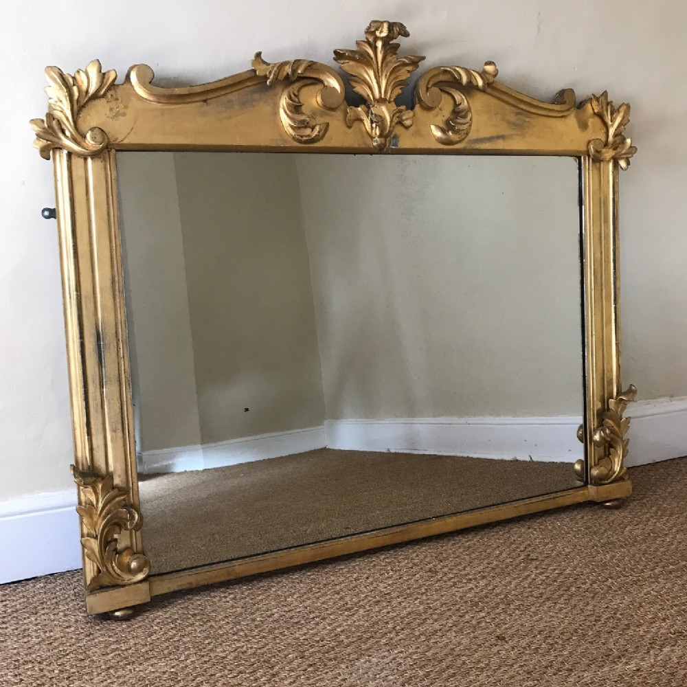 A William IV carved and gilt over mantle mirror circa 1835