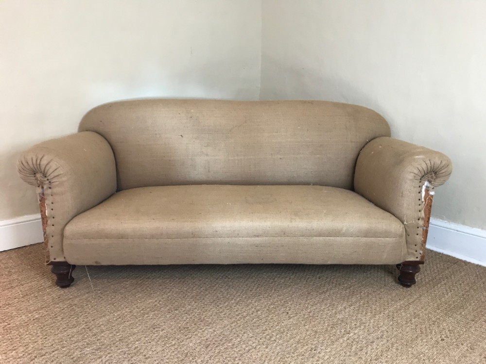 A late Victorian walnut sofa circa 1890
