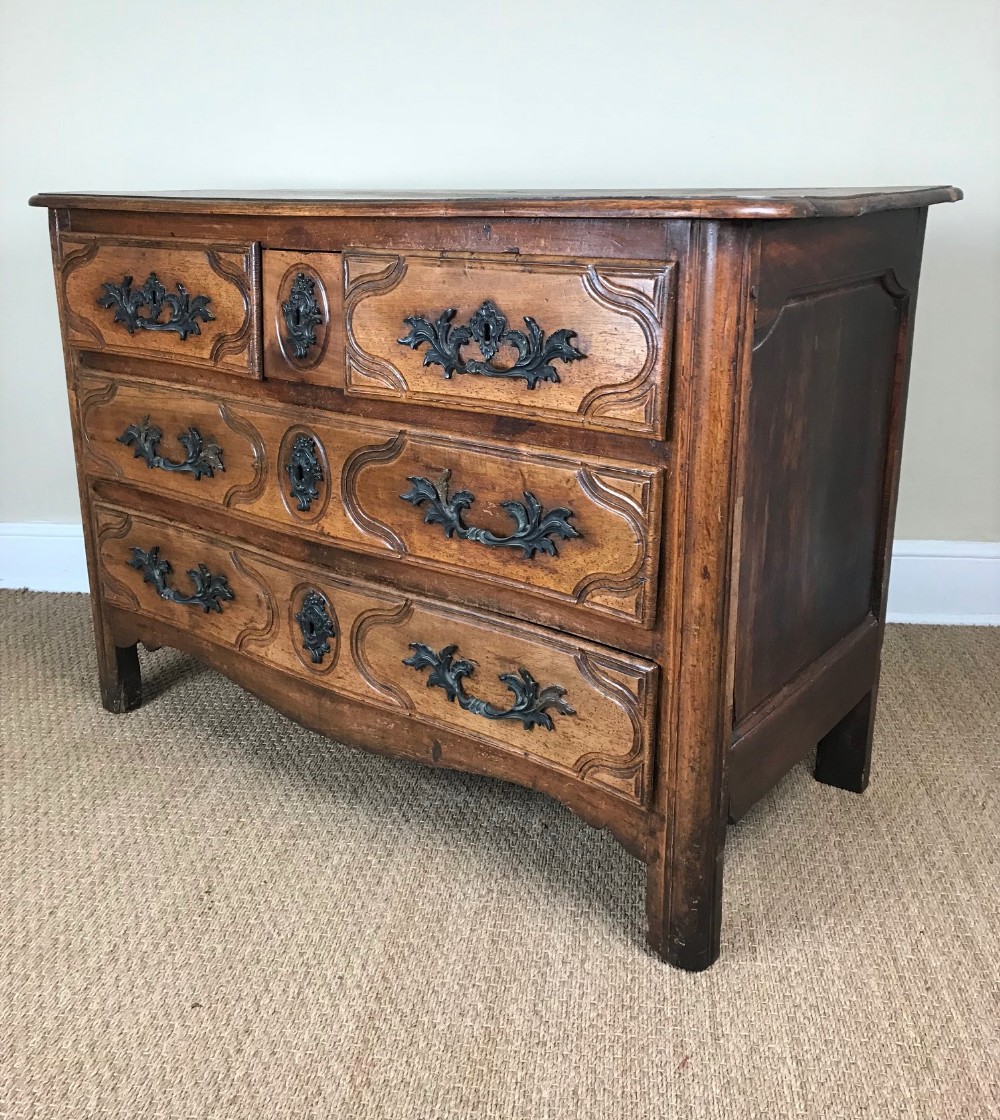 A Louis XV provincial walnut commode circa 1770