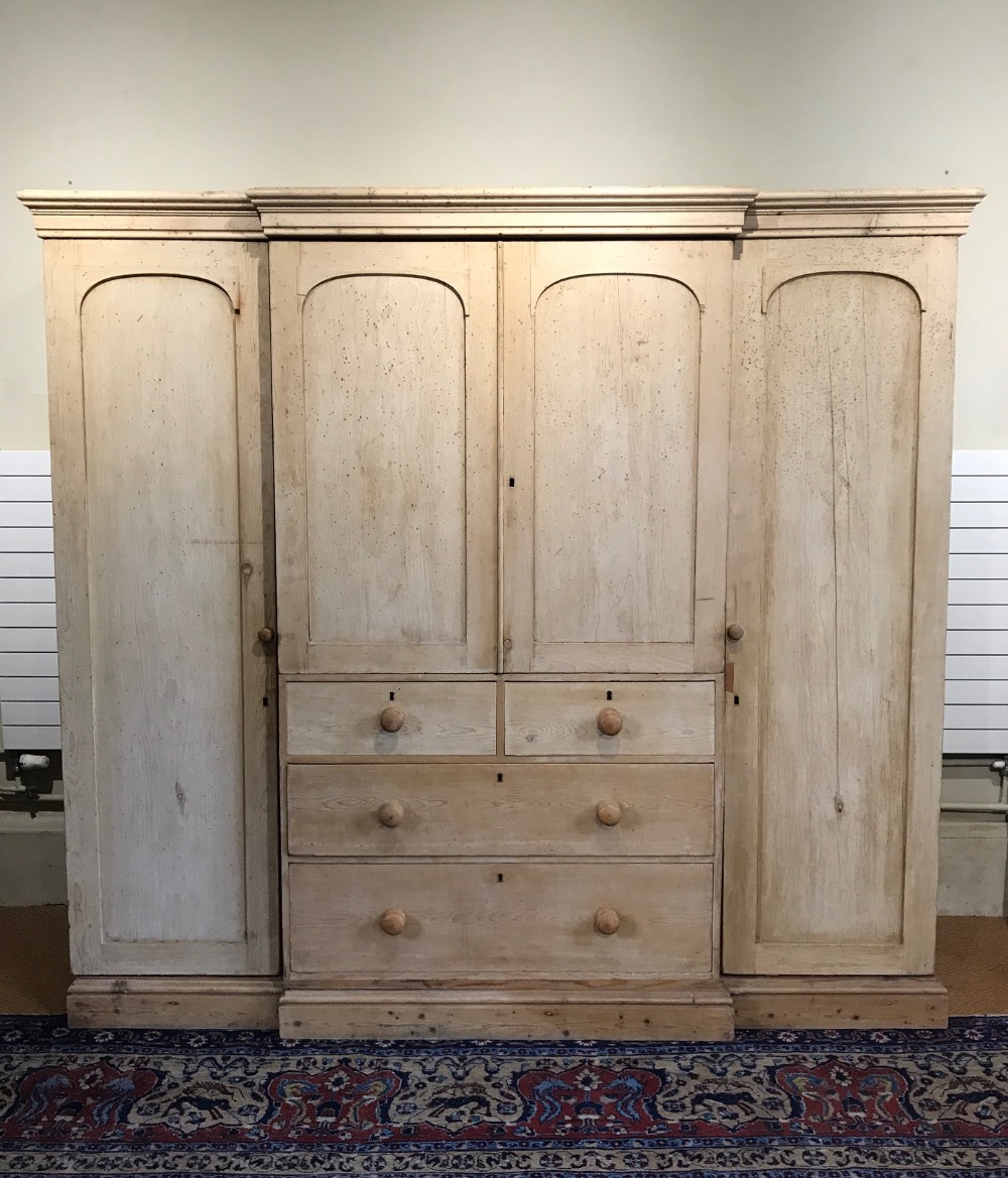 An early Victorian dry pine compactum wardrobe circa 1850