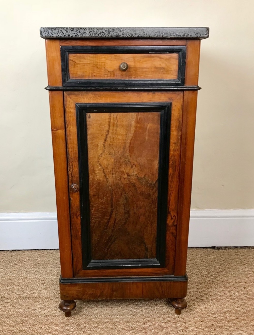 A late 19th century French walnut and ebonised bedside table circa 1880