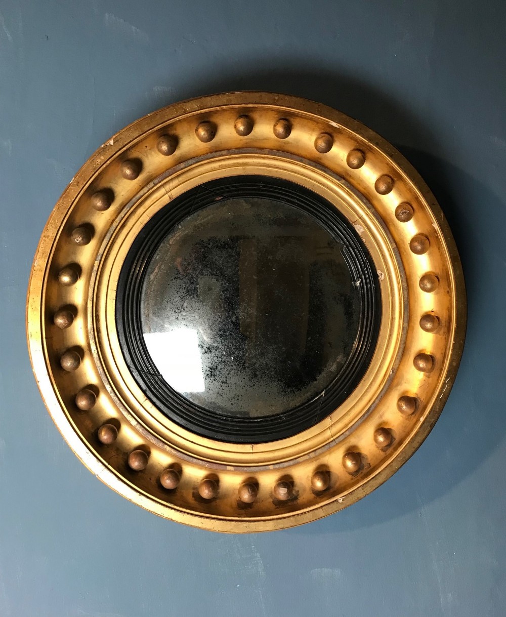 A small Regency gilt Convex mirror circa 1820