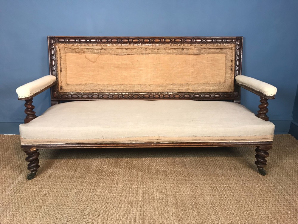 A Mid Victorian oak bobbin turned Sofa circa 1870 . View II
