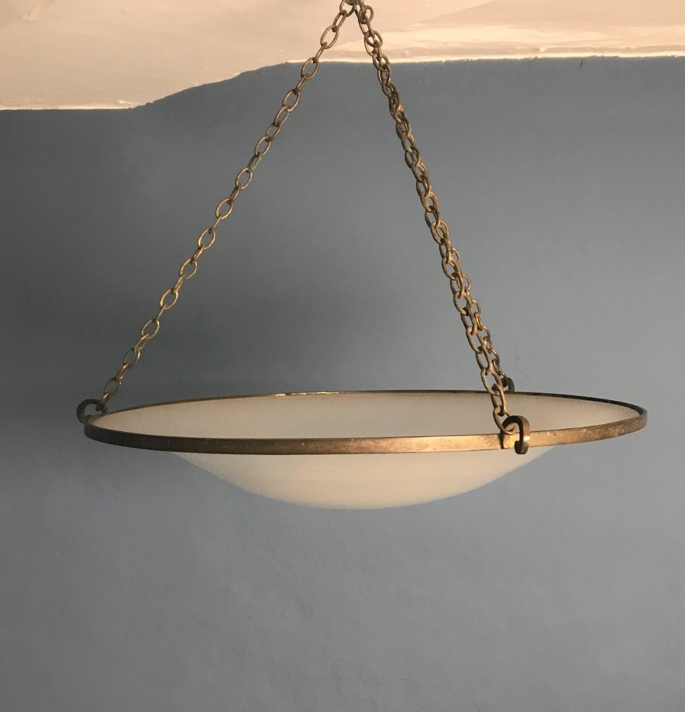 A 1930s opaline glass and brass dish light