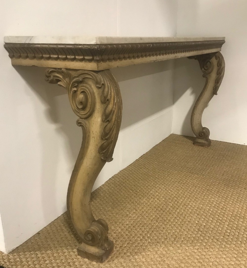 A George IV painted console table circa 1830 in the Grecian style