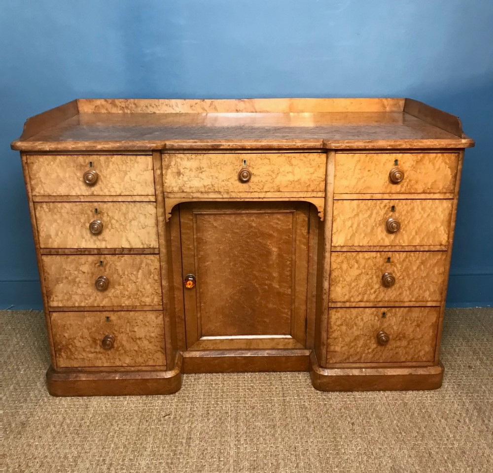 A Victorian birds eye maple dressing chest attributed to Holland and Sons c 1870