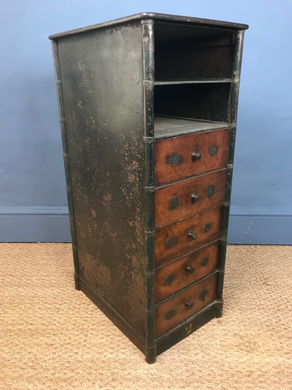 A mid 19th century iron and mahogany side cabinet c 1850