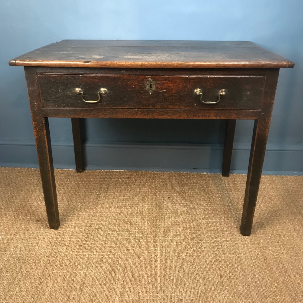 A George 111 oak country side table circa 1800 