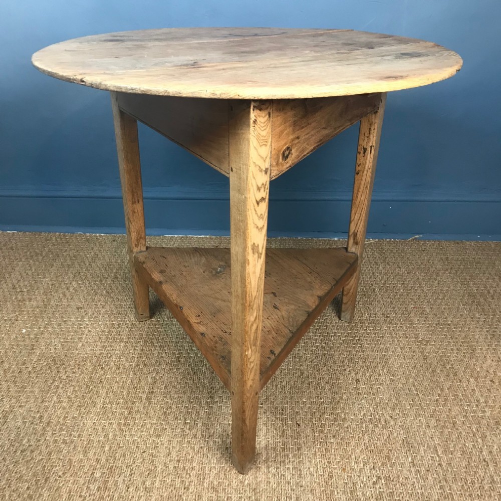 A Georgian West Country pine and ash cricket table circa 1800