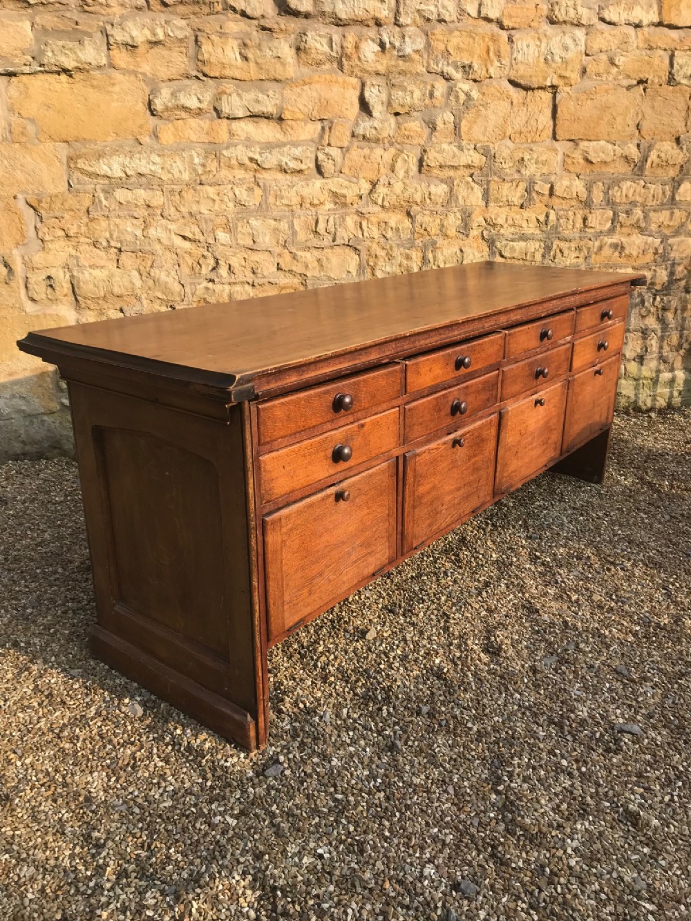 A Victorian oak pine and mahogany freestanding Shop Counter circa 1870