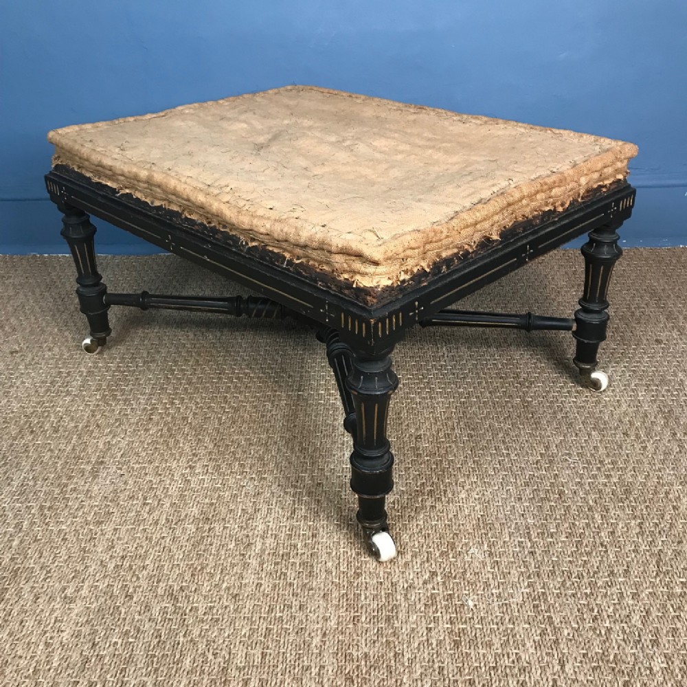 A large Victorian ebonised Aesthetic movement stool circa 1890.