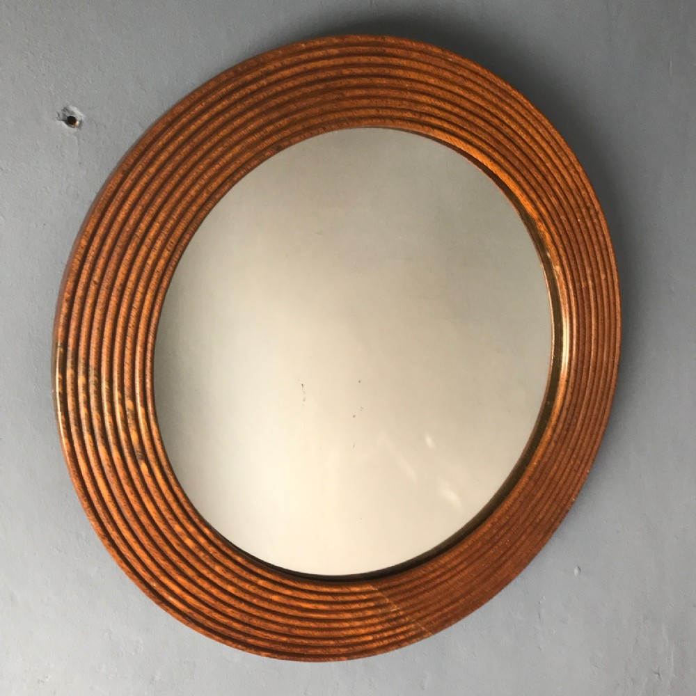 An Edwardian mahogany reeded circular mirror circa 1910.