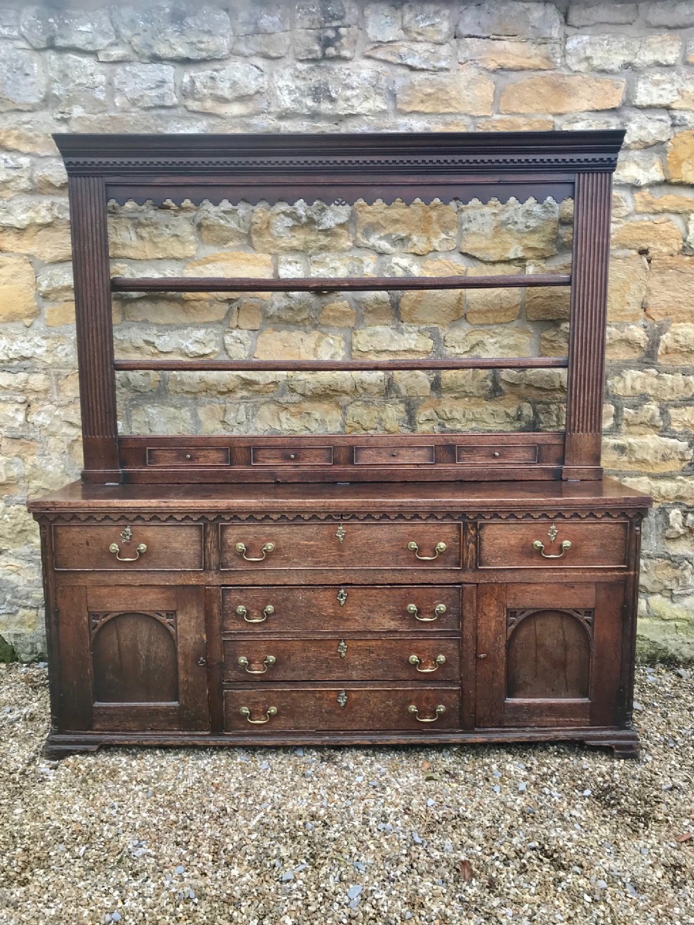 A George 111 Yorkshire oak architectural dresser circa 1770