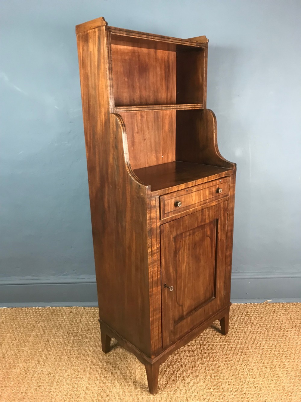 A Regency Mahogany waterfall bookcase circa 1820