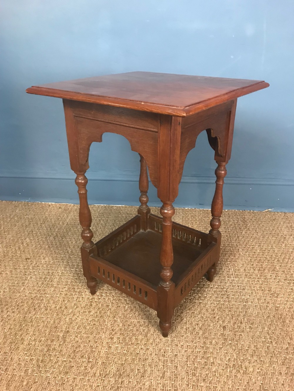 A Bombay Furniture company teak occasional table circa 1910