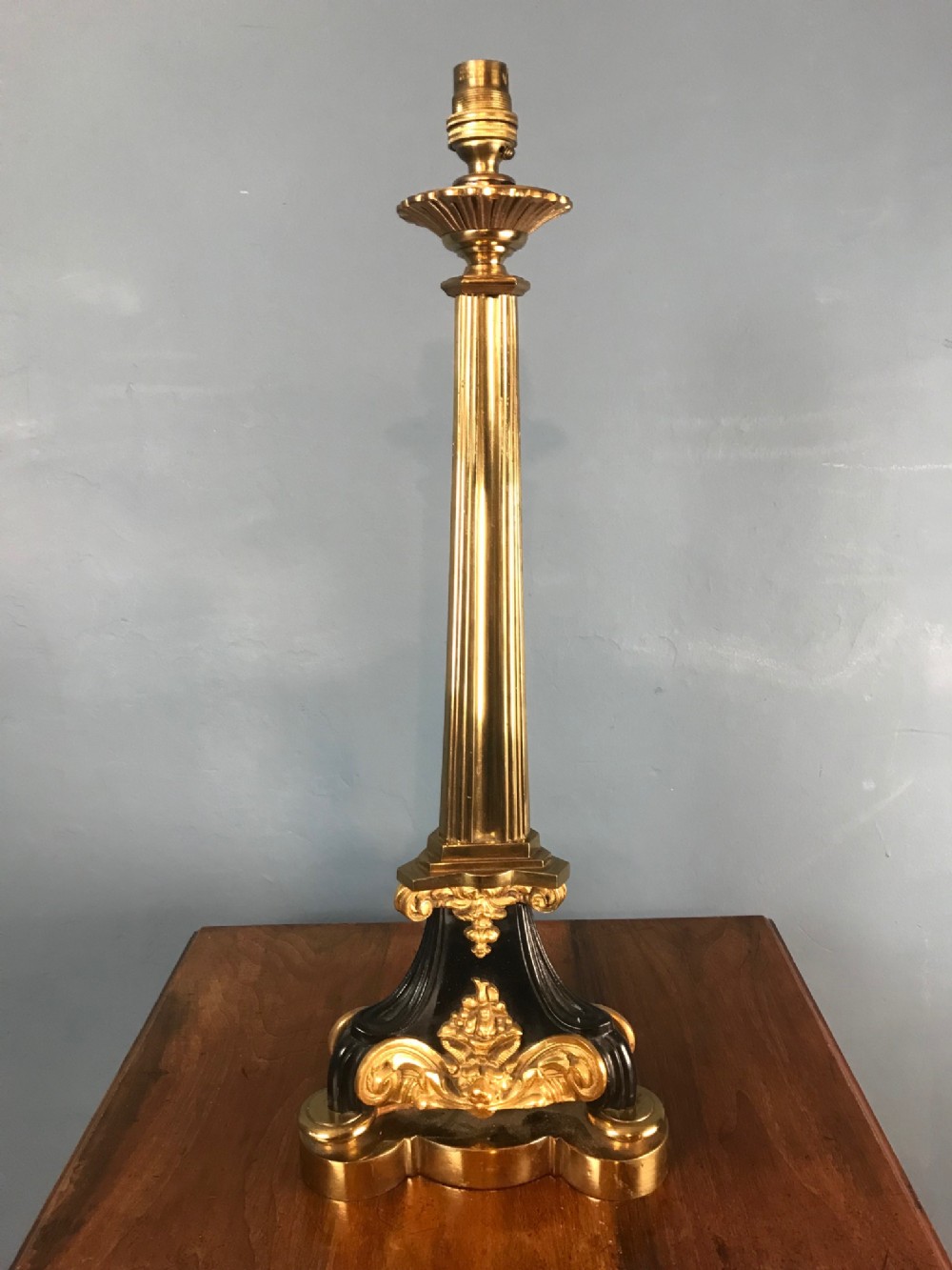 A George IV gilt brass and ebonised lamp circa 1830 by Messenger of London .