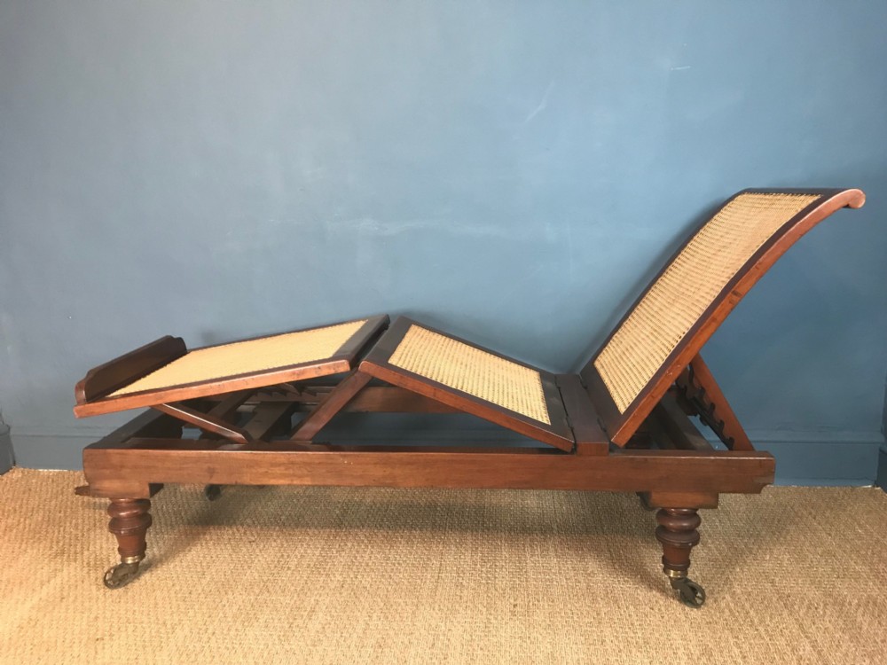 A Victorian walnut and cane campaign day bed circa 1890 by Carter of London