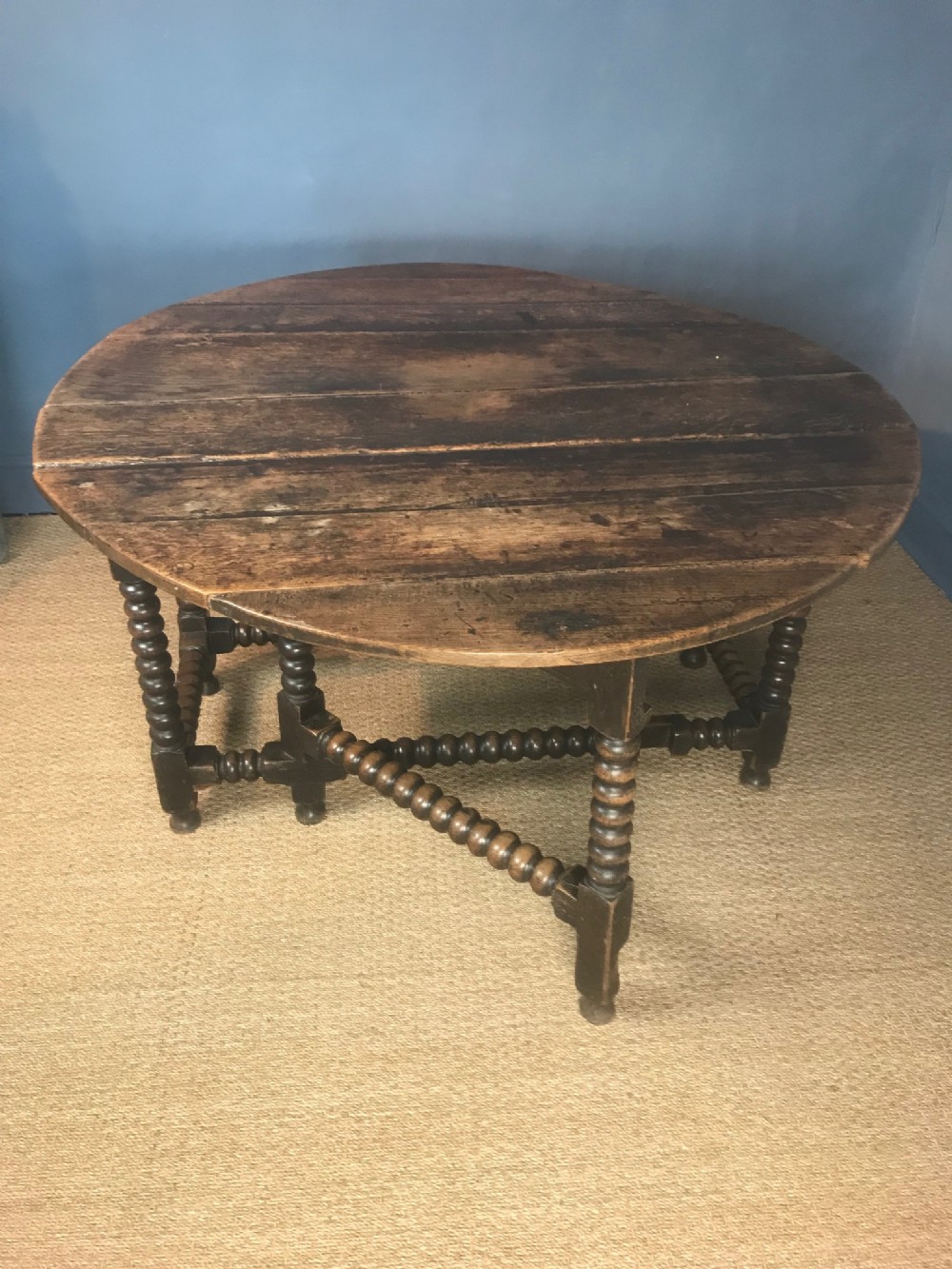 A 17th c oval oak gateleg table