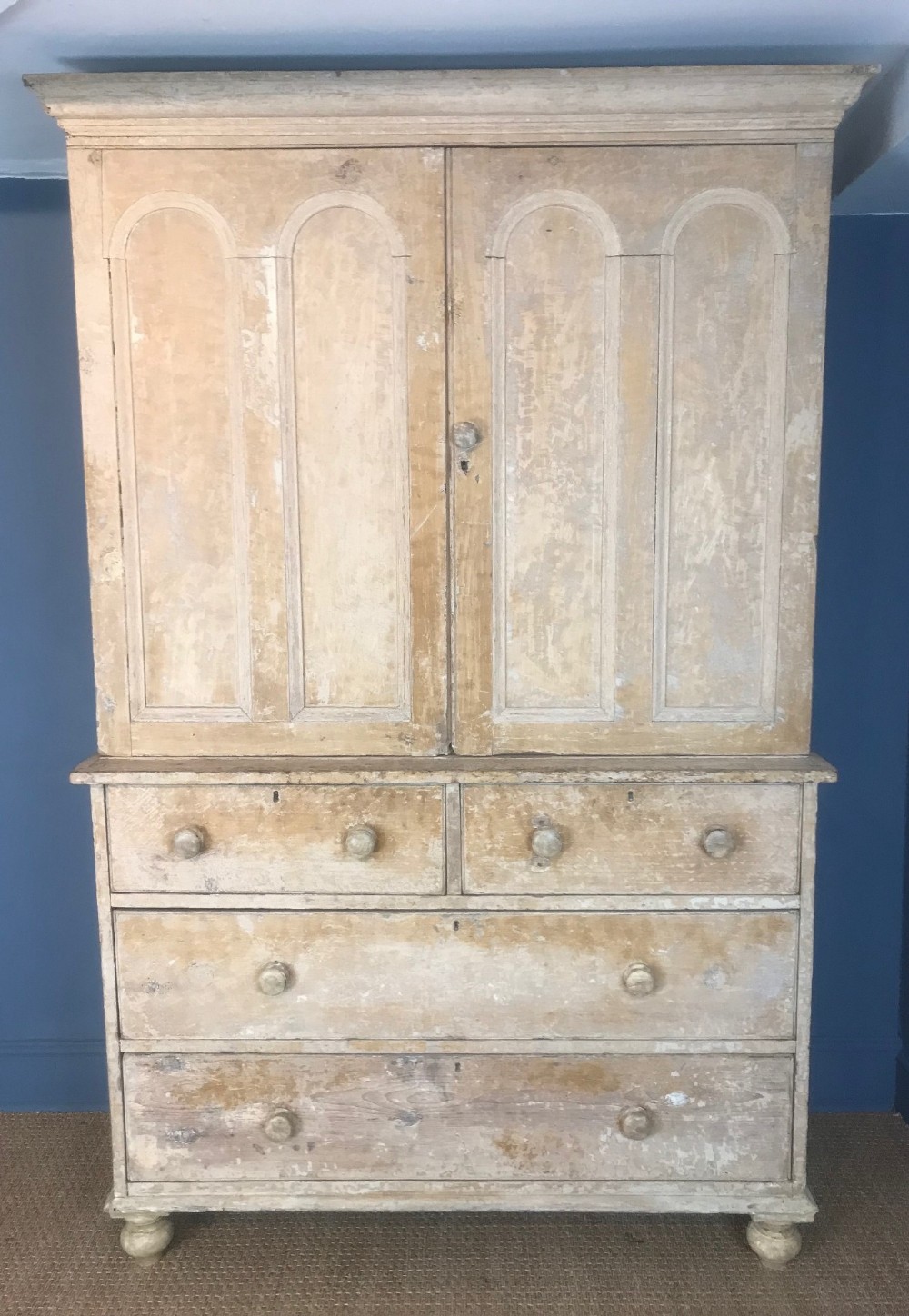 A Cornish painted pine linen press circa 1840 