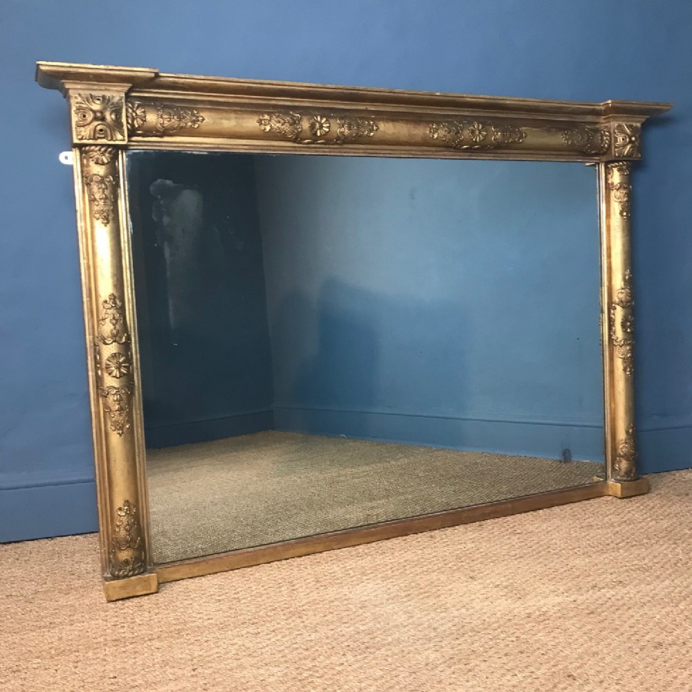 A large George IV gilt overmantel Mirror circa 1830 