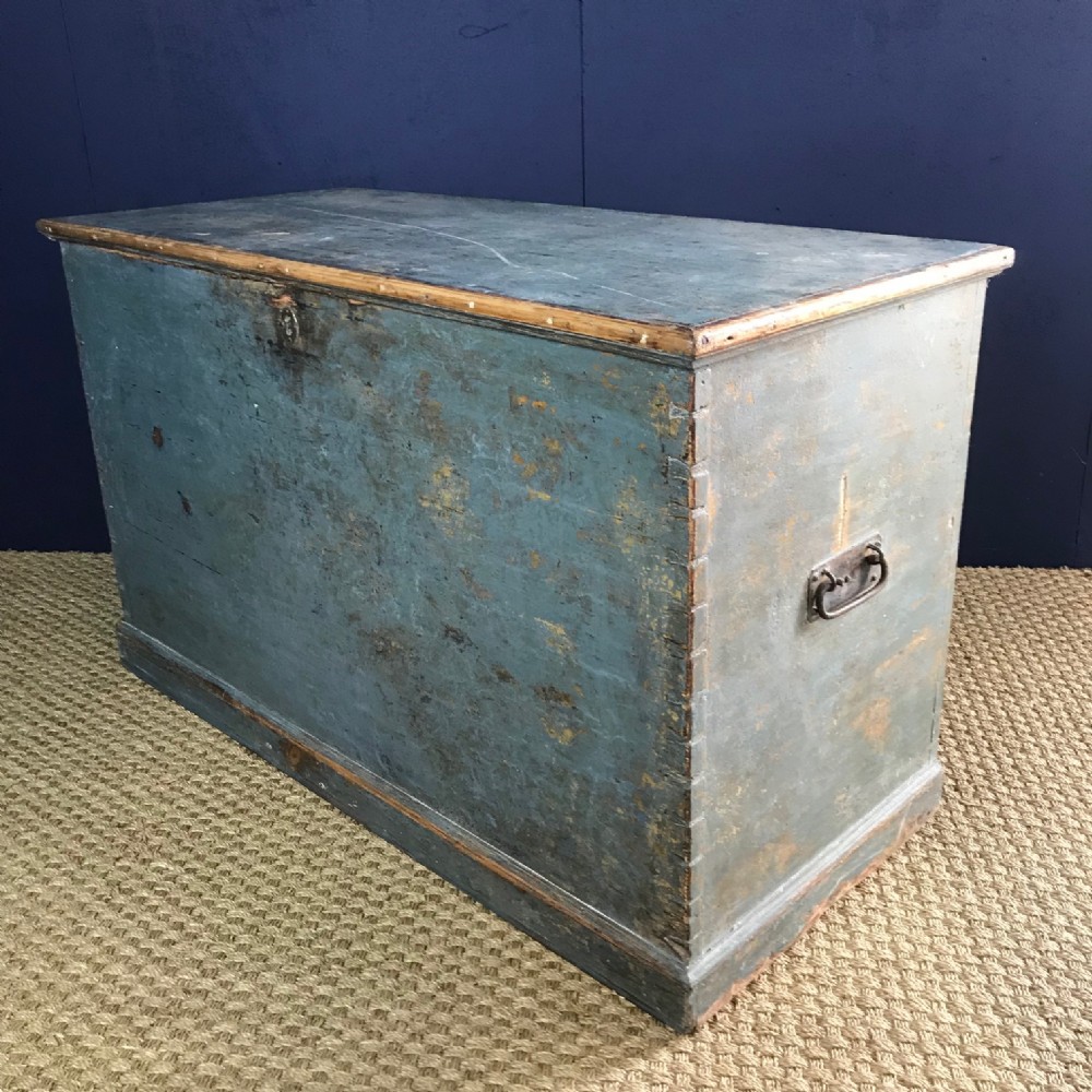A West Country Pine coffer circa 1830 in the original duck egg blue paint .