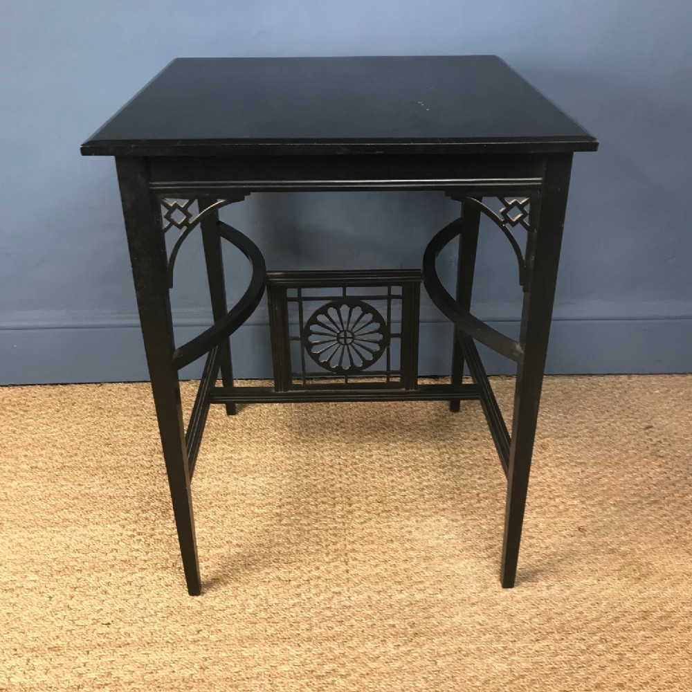 An Aesthetic Movement ebonised square table circa 1880