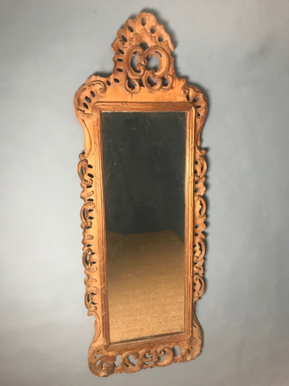 A late 19th century French carved beech wall mirror in rococo style circa 1880 