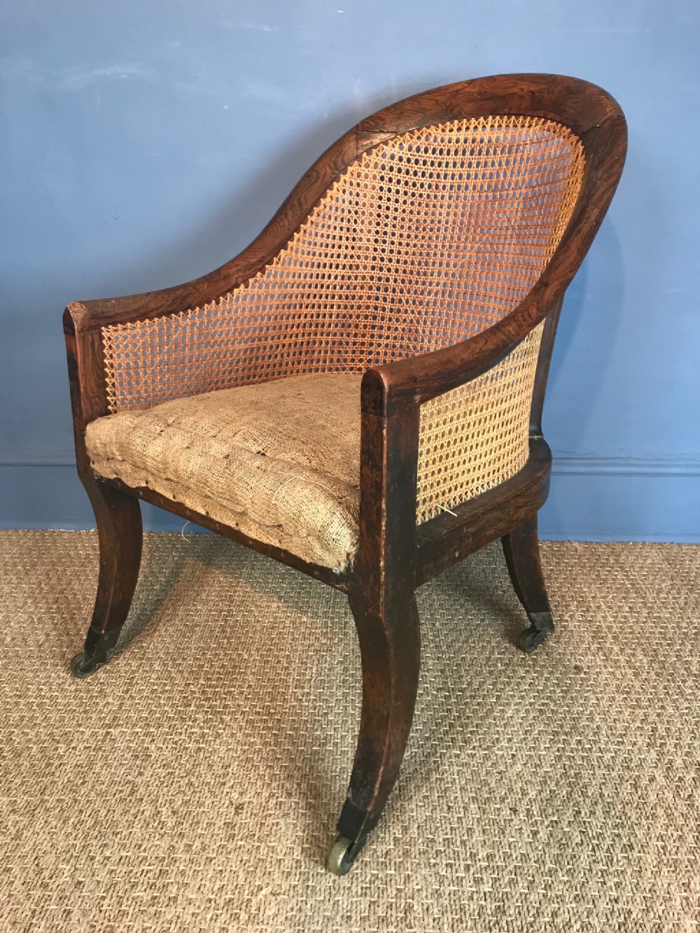 A Regency simulated rosewood bergere chair circa 1820