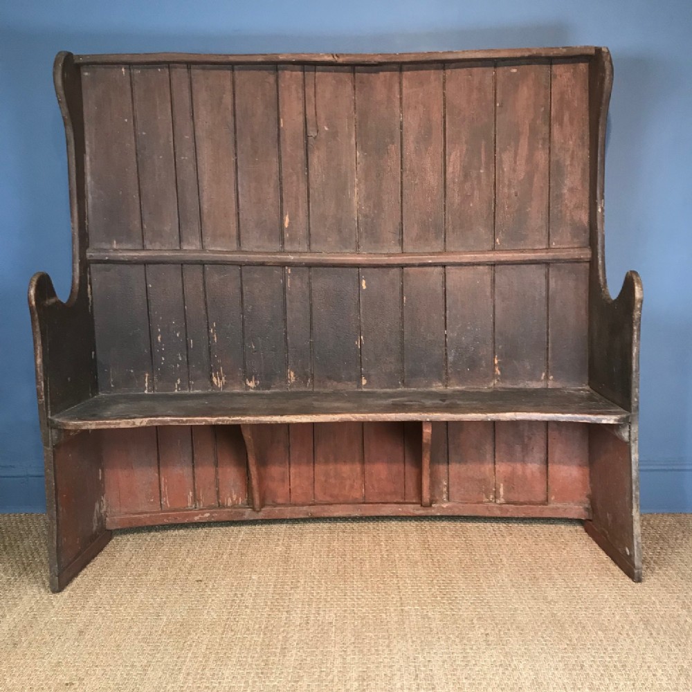 An 18th c painted elm Dorset settle in totally original condition