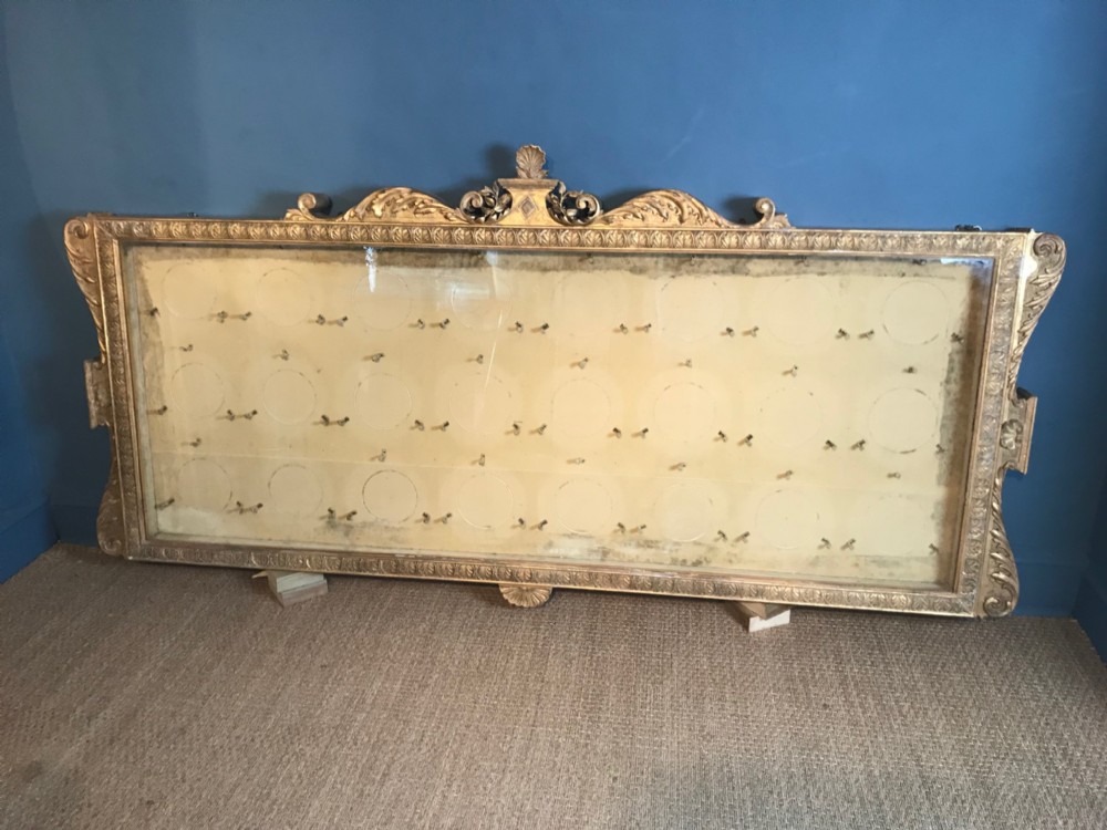 An enormous William IV gilt wood plate cabinet circa 1835