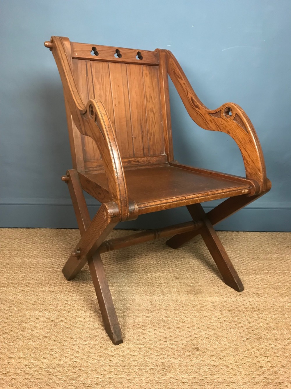 A Gothic Revival Oregon Pine armchair circa 1890 of Glastonbury design