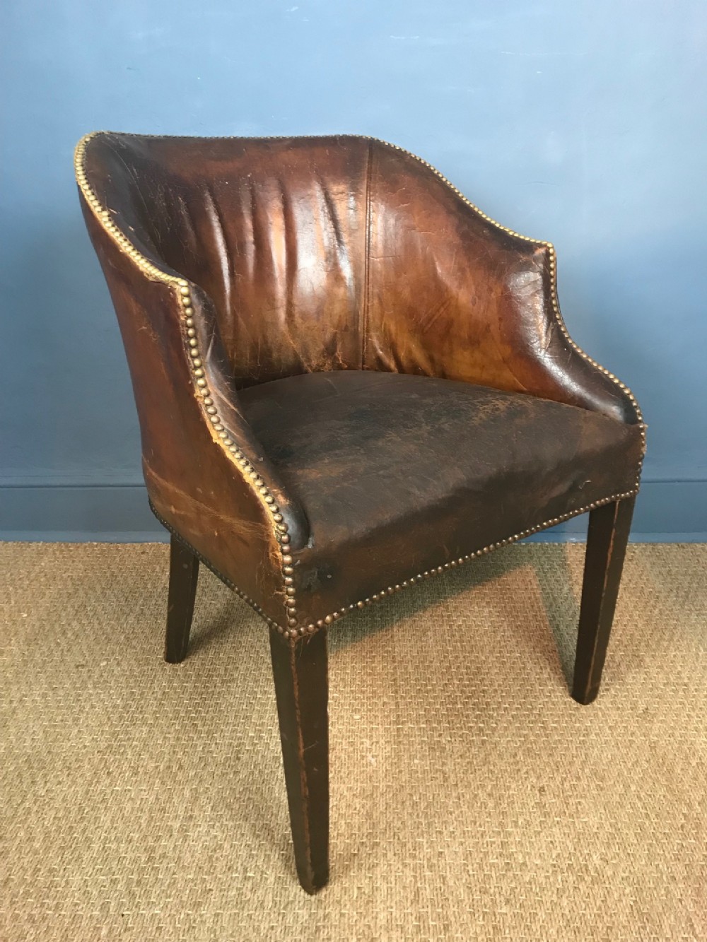 A George 111 style leather and mahogany desk chair circa 1900