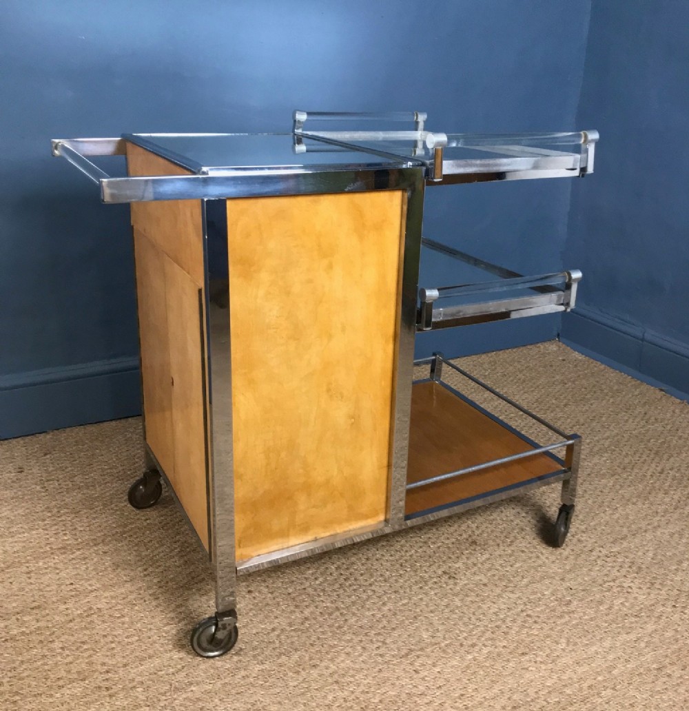 A Jacques Adnet birch chrome and glass bar trolley. Paris 1930