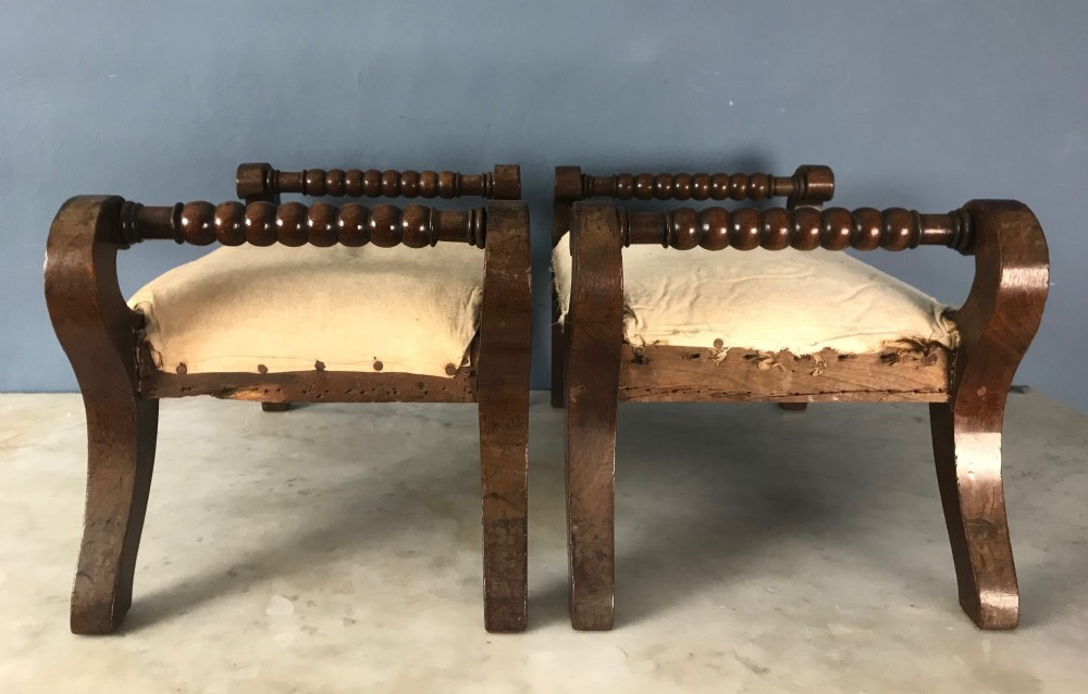 A pair of George IV mahogany footstools circa 1825