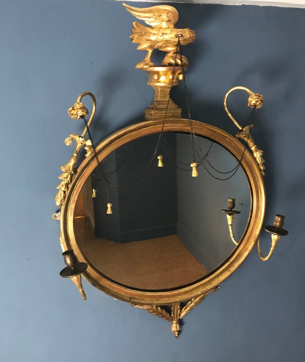 A Regency gilt oval mirror circa 1820
