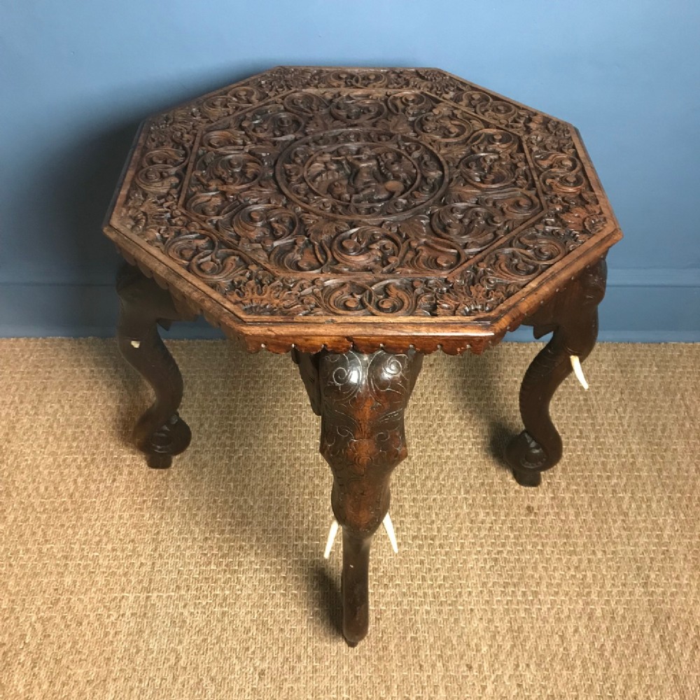 A large Anglo Indian carved octagonal elephant table. Bombay circa 1880