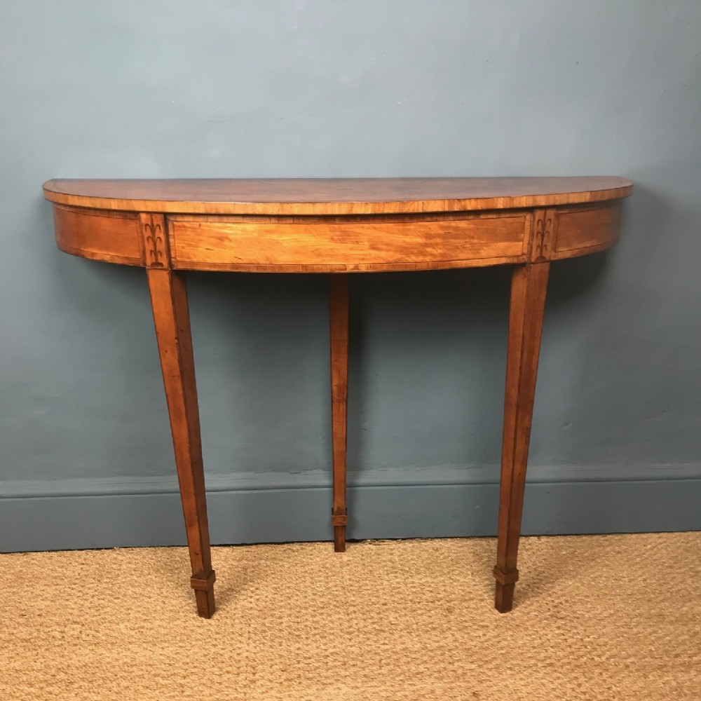 A George 111 satinwood and inlaid elliptical pier table circa 1790