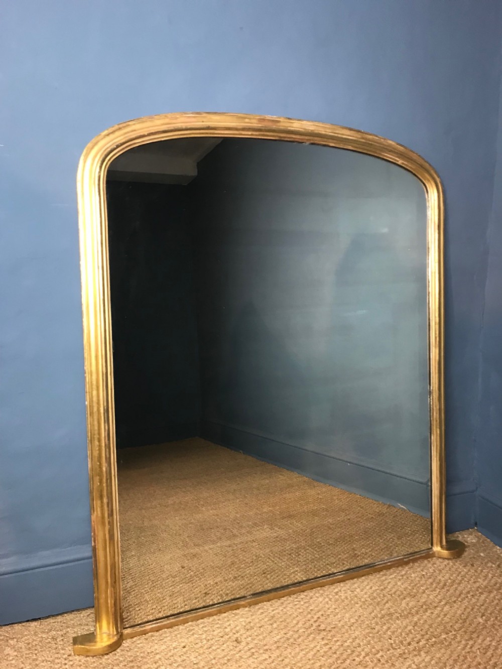 A large Victorian gilt overmantel mirror circa 1870