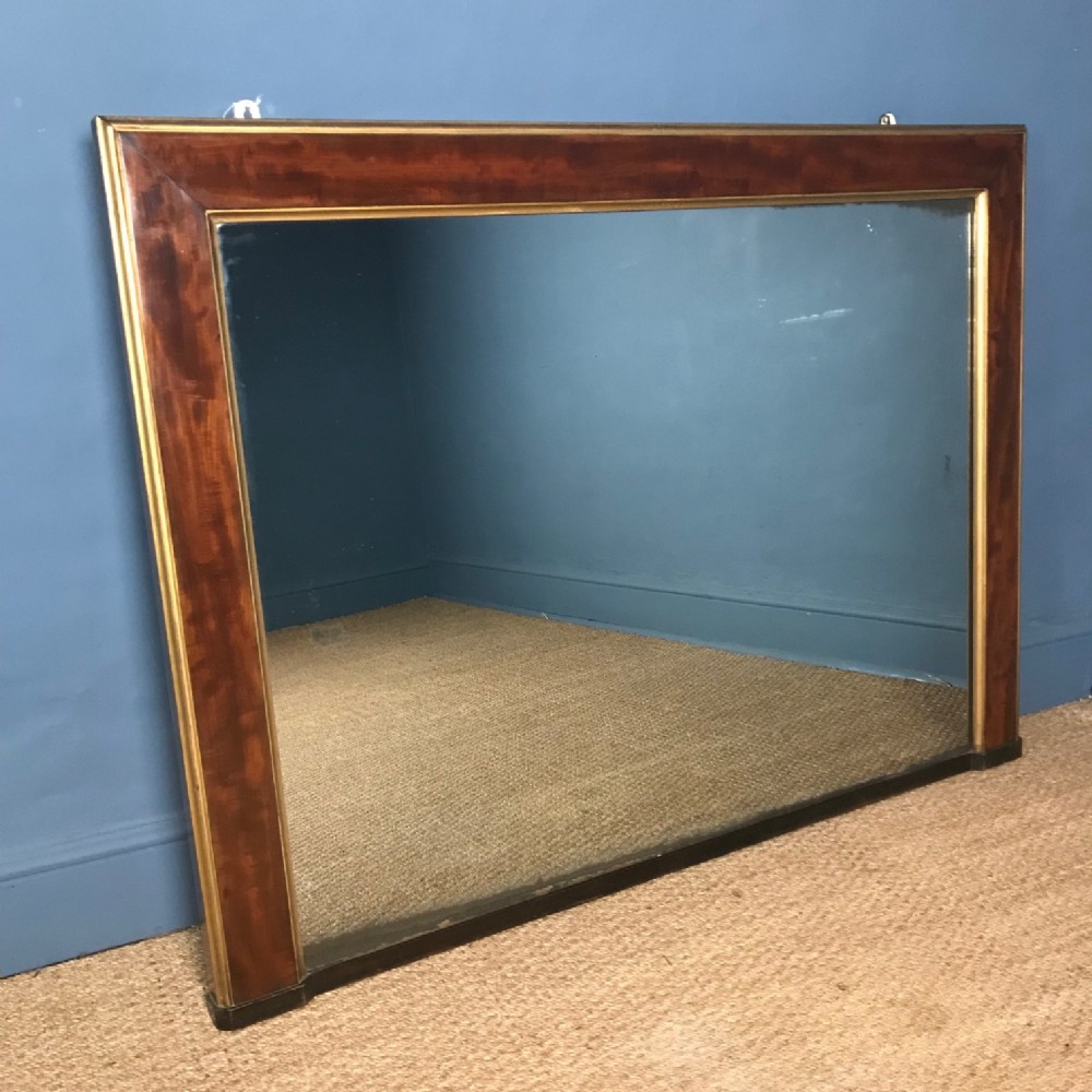 A William IV mahogany and parcel gilt over mantel mirror circa 1835