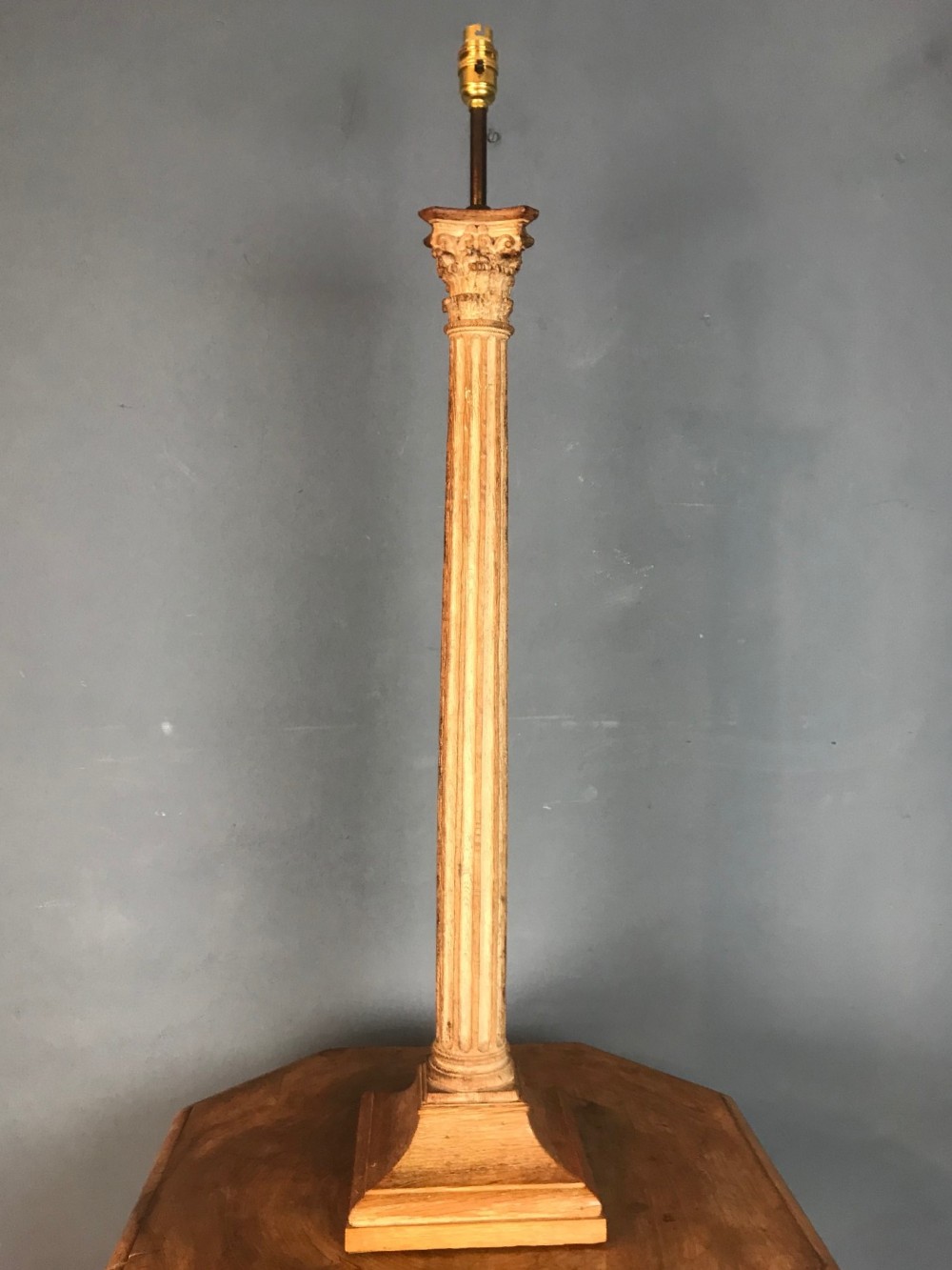 A large  Arts and Crafts oak Corinthian column table lamp circa 1910 in the style of Edwin Lutyens circa1910