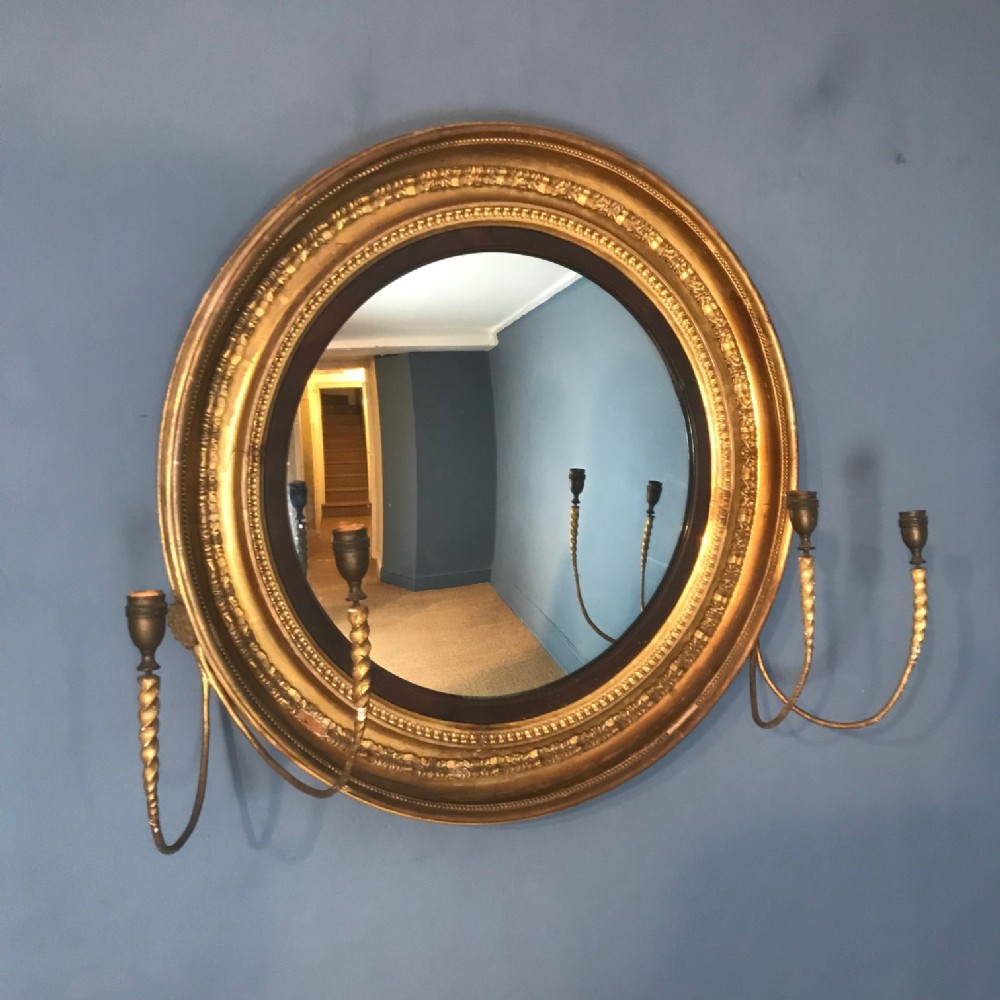  A large George 111 gilt convex mirror circa 1810. Provenance : Newton Park Bath