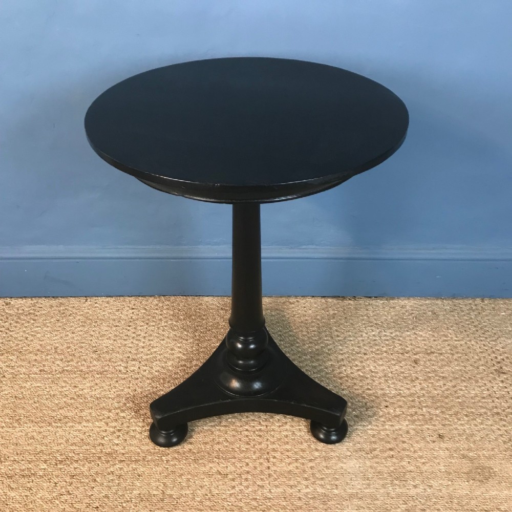 A William IV ebonised mahogany lamp table circa 1835.