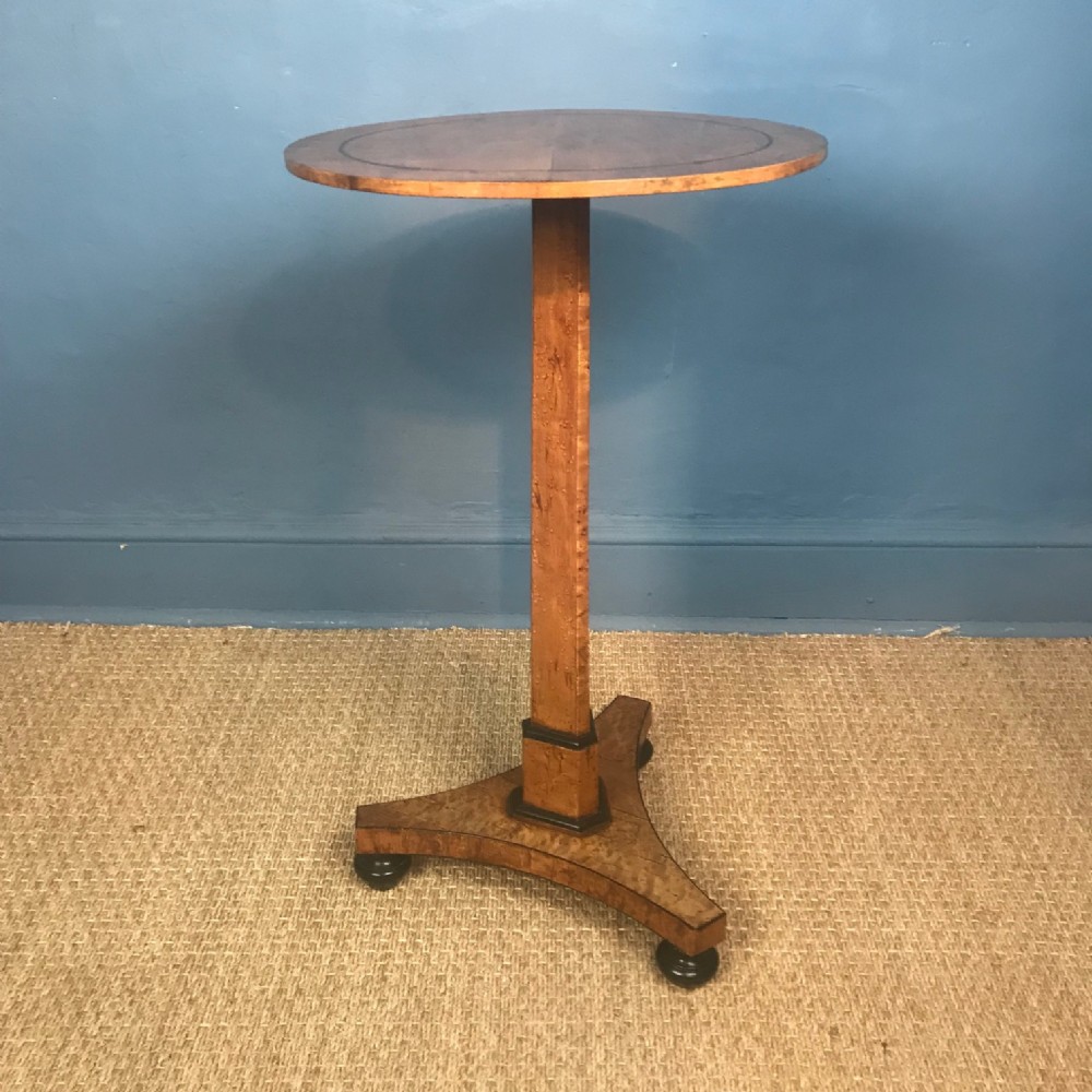 A Regency birds eye maple and ebony pedestal table circa 1820