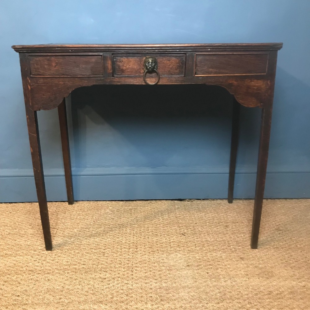 A George 111 oak side table circa 1820