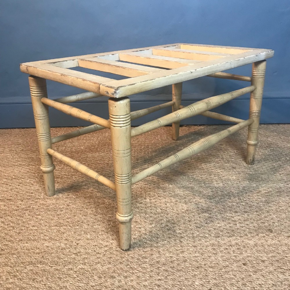 An Aesthetic Movement painted pine luggage rack circa 1880