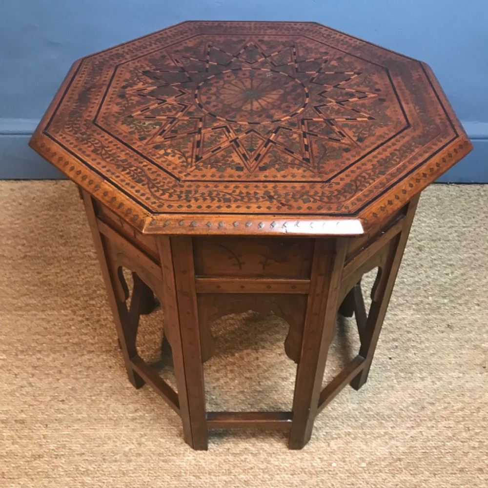 A Hoshiapur brass and ebony inlaid Shisham wood table . Northern India circa 1890
